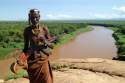 Old Karo warrior controlling the Omo river and Blumi tribe a