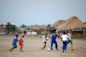 Children playing to the football in Boquilla