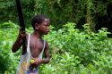 Ir a Foto: Niño Palenquero - Cartagena de Indias 
Go to Photo: Child with machete peeling oranges in Palenque