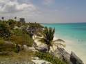 General View of Tulum Beach with the archologic ruins on bac