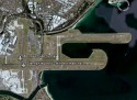 Sydney AIrport is lokated in the bay of Sydney, just 9 km fr