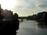 Ponte Vecchio with the sun in the background, Florence.