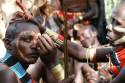 Go to big photo: Hamer tribe painting their faces - Omo Valley - Ethiopia