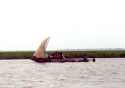 Go to big photo: Cargo boat in Ganvie